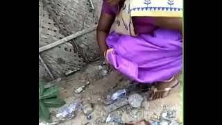 Tamil wife pee in Front of husband in outdoor